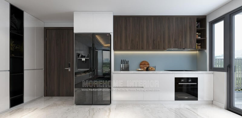 Sự kết hợp hoàn mỹ của 2 tone màu nêu trầm của gỗ Veneer óc chó và màu trắng của gỗ Acrylic đem lại không gian đầy tinh tế và mới lạ cho không gian nội trợ của gia chủ Thiết kế và sản xuất tủ bếp đẹp