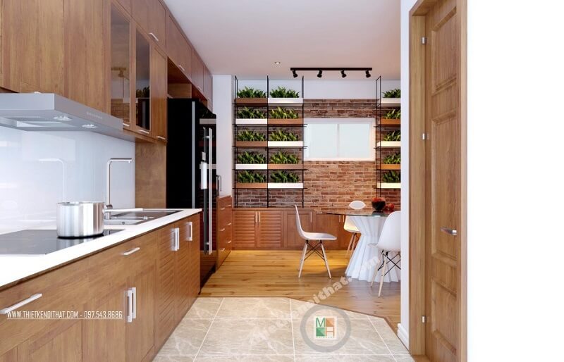 Thiết kế phòng bếp chung cư hiện đại với hệ tủ bếp gỗ tự nhiên cao cấp mang đến không gian nấu ăn lí tưởng cho các chi em nội trợ. tủ bếp chung cư