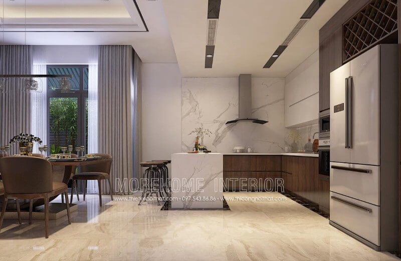 Mẫu thiết kế tủ bếp biệt thự kết hợp bàn đảo, bàn ăn phụ tạo cho gia chủ một không gian nấu nướng và dùng bữa tiện nghi hơn cả