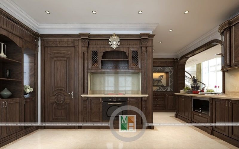 Thiết kế hệ tủ bếp gỗ tự nhiện cao cấp tân cổ điển màu nâu trầm cùng đường vân tinh tế mang đến vẻ đẹp sang trong đẳng cấp cho gia chủ.